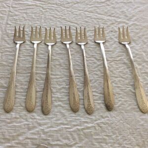 Elegant 7 Silver Dessert Forks